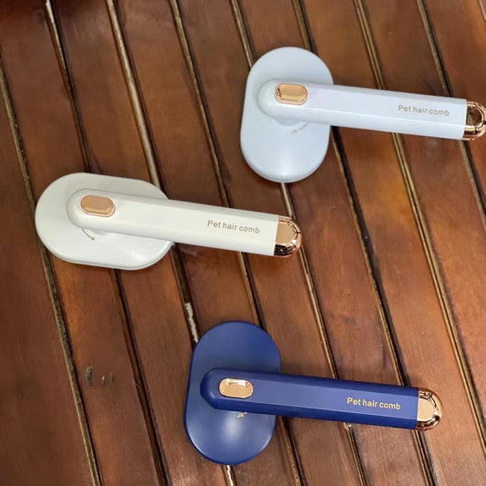 Curved deshedding comb removing loose undercoat from a dog