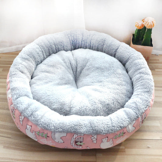 Cat curled up in a round cotton-padded pet bed