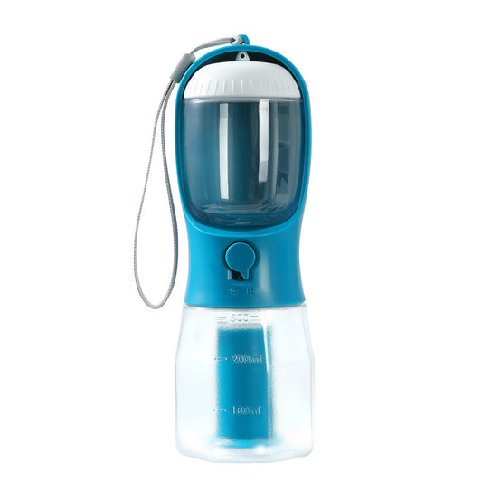 Portable dog water bottle pouring fresh water into built-in bowl on a walk
