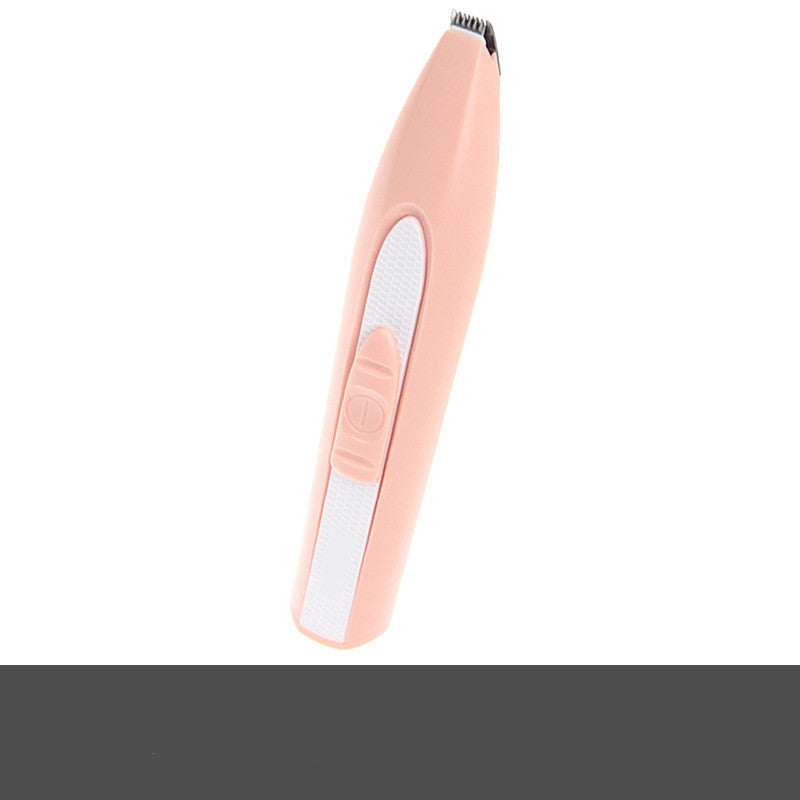 Electric pet grooming clipper trimming a dog's coat at home