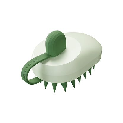 Handheld pet bath brush removing loose fur during a wash