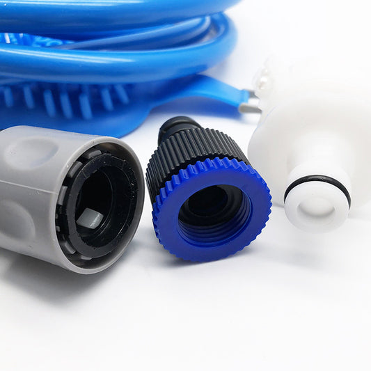 Pet shower brush rinsing a dog with water flowing through silicone bristles